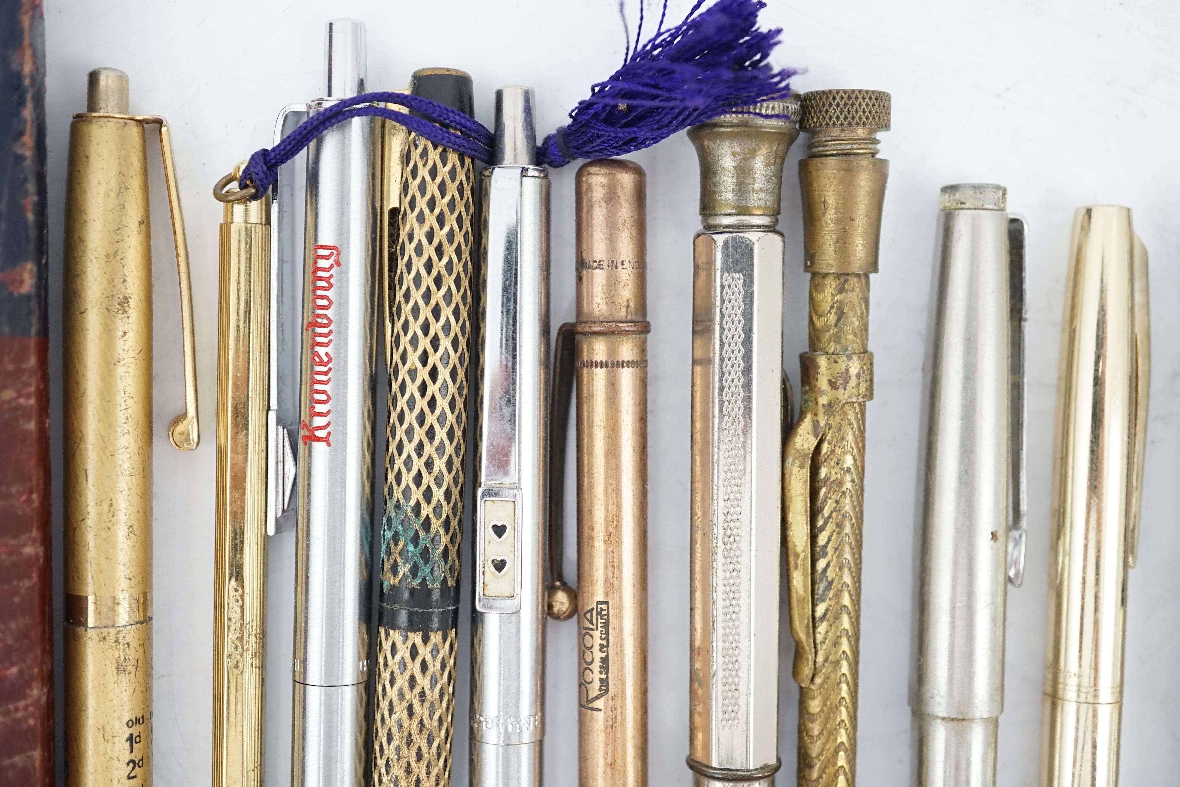 A collection of pens, pencils and stationery equipment, including a Parker Vacumatic